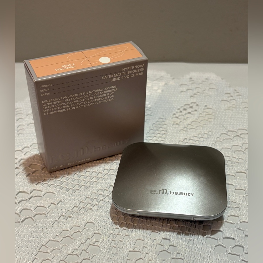 R.E.M. Beauty Hypernova Satin Matte Bronzer. The shade is Send 2 Voicemail